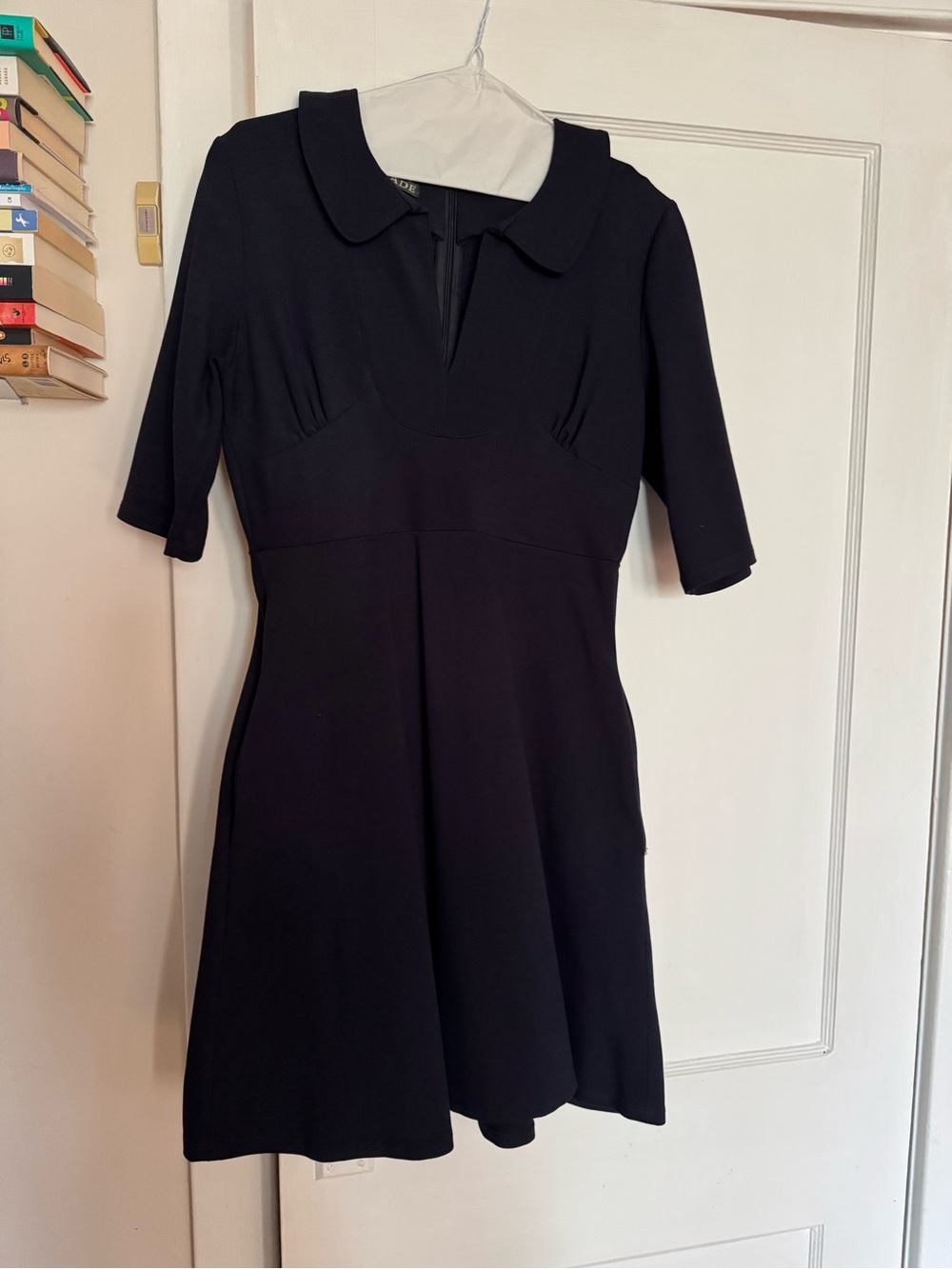 Navy blue collared dress, empire waist, swing skirt